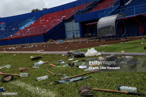 Shoes and belongings left inside the Kanjuruhan Stadium after the pitch invasion and stampede on October 03, 2022 in Malang, Indonesia. A riot and...