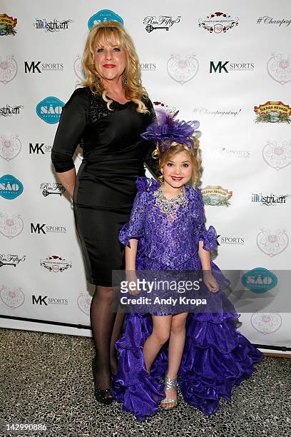Mickie Wood and Eden Wood attend the "Eden's World" premiere party at Room Fifty5 at Dream Midtown on April 16, 2012 in New York City.