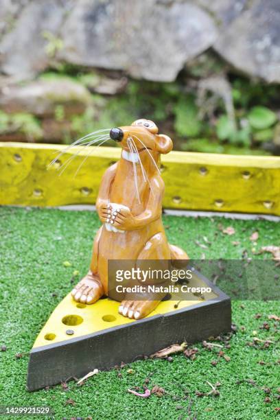 figure of a mouse on top of a cheese. - tooth fairy stock pictures, royalty-free photos & images