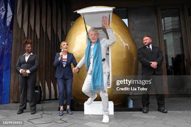 Sir Ian McKellen appears from a giant golden egg during his announcement for an Ambassador Theatre Group Productions, UK and Ireland Tour Of "Mother...