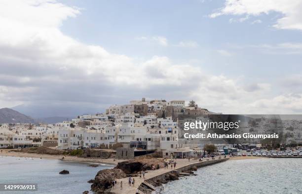 The Chora of Naxos and its harbour on September 27, 2022 in Santorini, Greece. Naxos is a popular tourist destination. It has a number of beaches and...