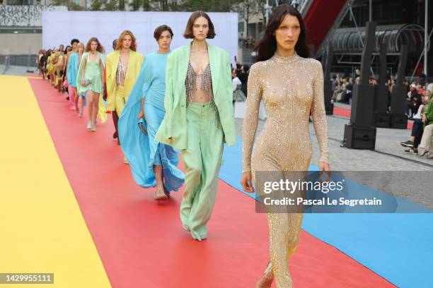 Bella Hadid and models walk the runway during the Stella McCartney Womenswear Spring/Summer 2023 show as part of Paris Fashion Week on October 03,...