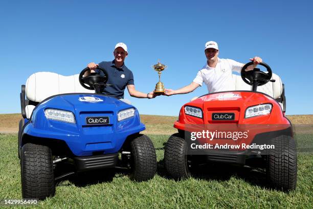 Team captains Luke Donald of England and Zach Johnson of United States pose for a photograph with the Ryder Cup during the Ryder Cup 2023 Year to Go...