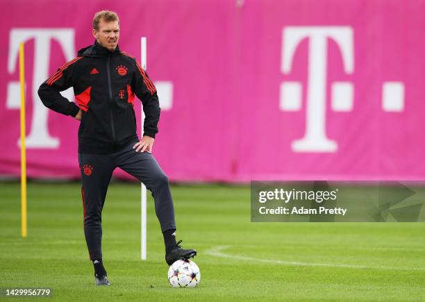 Julian Nagelsmann head coach of Bayern Munich keeps an eye on training today ahead of their UEFA Champions League group C match against Viktoria...