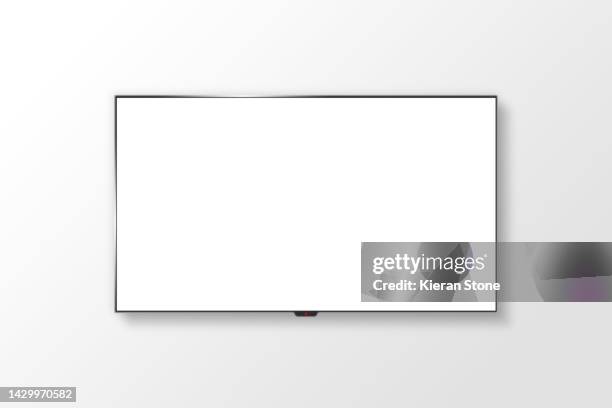 blank wall mounted tv - televisietoestel stockfoto's en -beelden