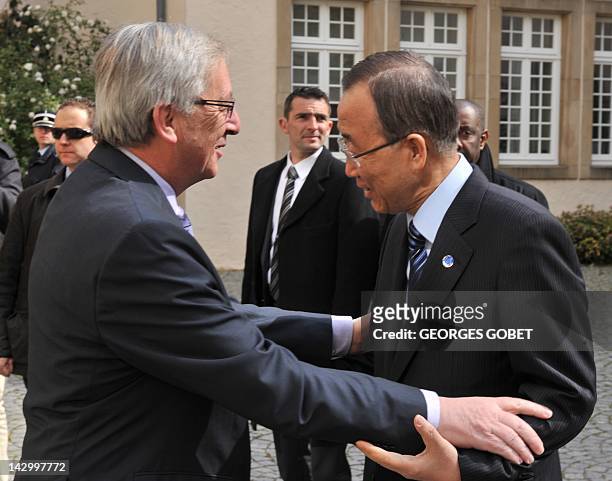 Luxembourg Prime minister Jean-Claude Juncker welcomes UN Secretary General Ban Ki-Moon on April 17, 2012 prior to a working session at the Hotel de...