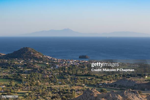 view of skala eressos (skala eresou) towards chios. mytilene, lesvos, greece - skala greece fotografías e imágenes de stock