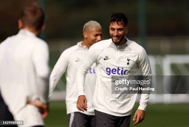 Rodrigo Bentancur of Tottenham Hotspur reacts during a training session at Tottenham Hotspur Training Centre ahead of their UEFA Champions League...