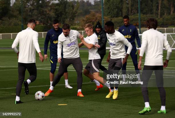 Pierre-Emile Hojbjerg and Harvey White of Tottenham Hotspur compete during a training session at Tottenham Hotspur Training Centre ahead of their...