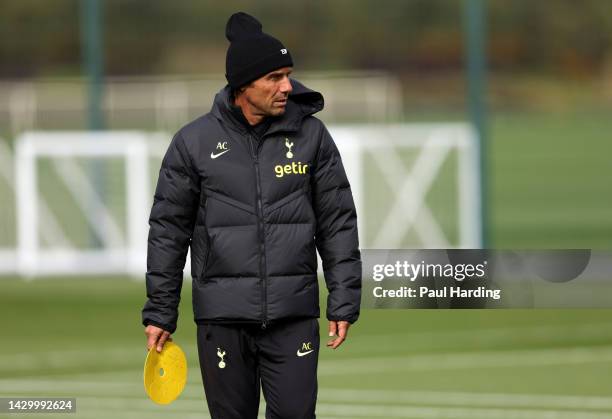 Antonio Conte, Manager of Tottenham Hotspur looks on during a training session at Tottenham Hotspur Training Centre ahead of their UEFA Champions...