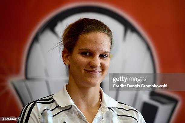 Desiree Schumann of Frankfurt smiles during the Women's DFB Cup Final press conference at RheinEnergieStadion on April 17, 2012 in Cologne, Germany.