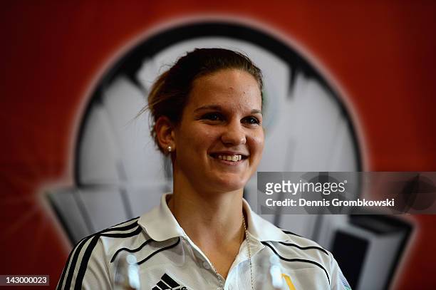 Desiree Schumann of Frankfurt smiles during the Women's DFB Cup Final press conference at RheinEnergieStadion on April 17, 2012 in Cologne, Germany.