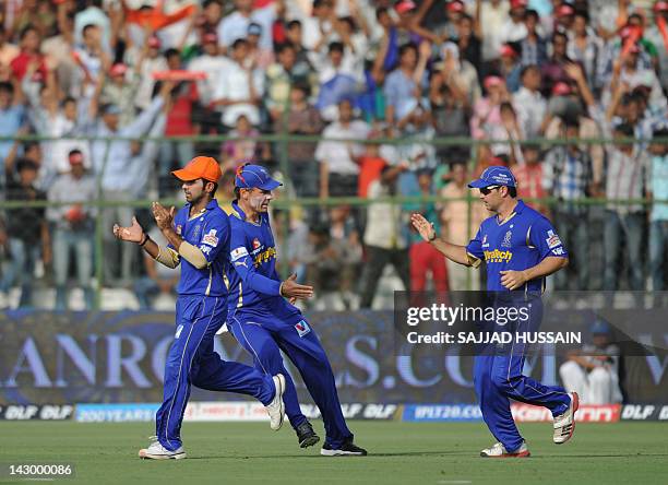 Rajasthan Royals team players celebrate after Siddharth Trivedi dismissed Deccan Chargers batsman Shikhar Dhawan during the IPL Twenty20 cricket...