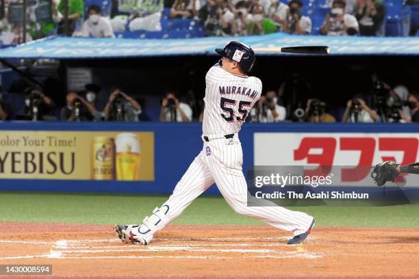 Munetaka Murakami of the Yakult Swallows hits a solo home run, 56th in this season, in the 7th inning against Yokohama DeNA Baystars at Jingu Stadium...