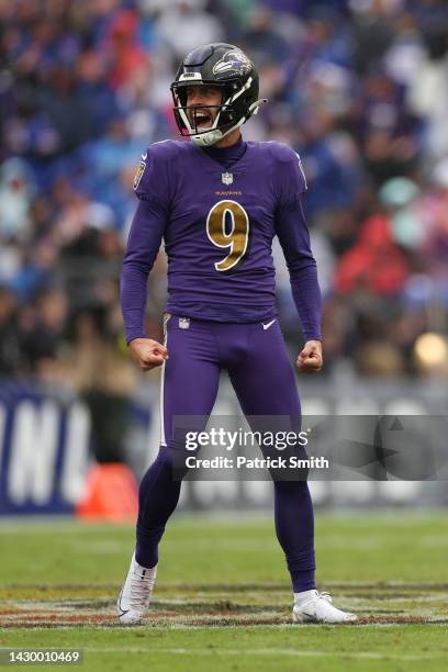 Kicker Justin Tucker of the Baltimore Ravens celebrates after kicking a field goal in the second quarter against the Buffalo Bills at M&T Bank...