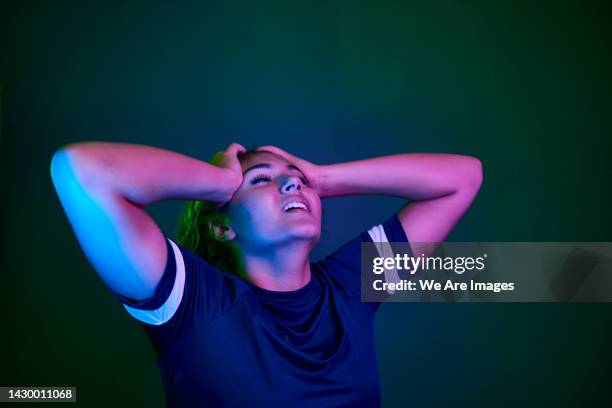 woman licking upset - athlete defeat stock pictures, royalty-free photos & images