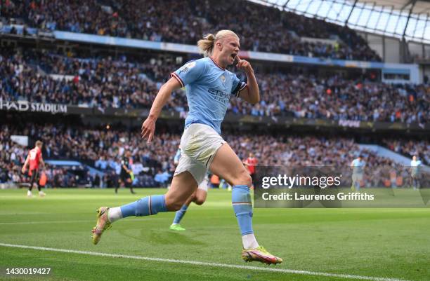 Erling Haaland of Manchester City celebrates their sides third goal during the Premier League match between Manchester City and Manchester United at...