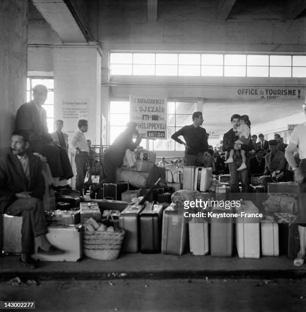 Repatriated people from Algeria arrive in Marseille aboard the ship Ville De Tunis, in Marseille, France on July 20, 1962.