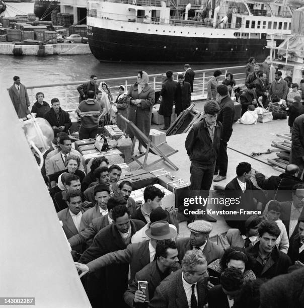 Repatriated people from Algeria arrive in Marseille aboard the ship Ville De Tunis in Marseille, France, on July 20, 1962.