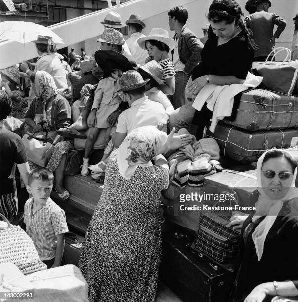 Repatriated people from Algeria arrive in Marseille aboard the Ship Ville De Tunis in Marseille, France, on July 20, 1962.