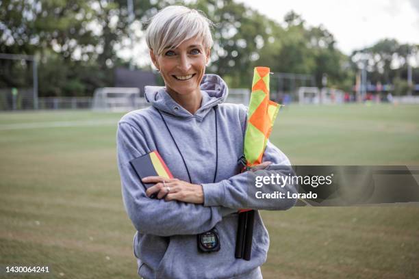 beautiful female soccer referee - referee portrait stock pictures, royalty-free photos & images