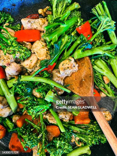 stir fry chicken and vegetables - stir frying european stock pictures, royalty-free photos & images