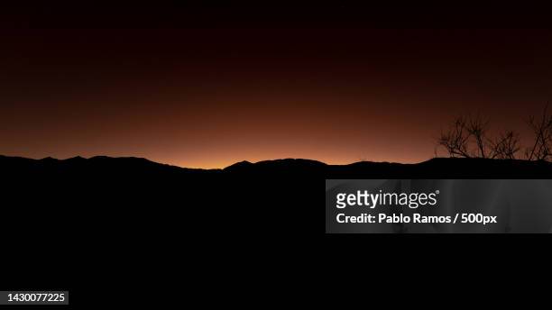 scenic view of silhouette of mountains against clear sky at sunset,volcan,jujuy,argentina - ecosistema 個照片及圖片檔