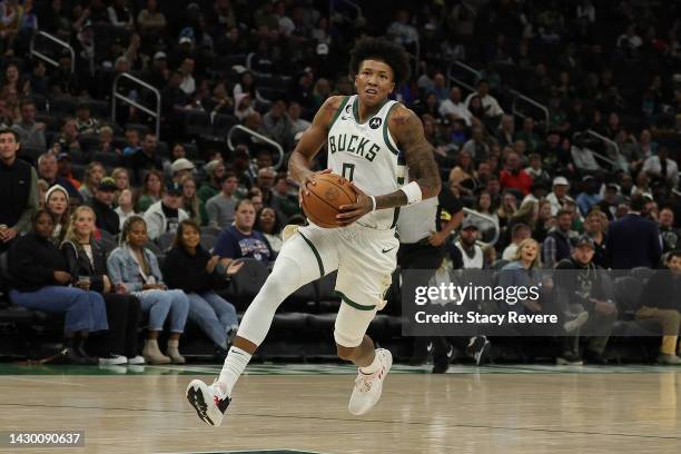 MarJon Beauchamp of the Milwaukee Bucks handles the ball against the Memphis Grizzlies during a preseason game at Fiserv Forum on October 01, 2022 in...