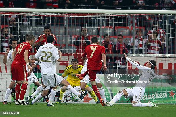 Franck Ribery of Bayern scores the first goal during the UEFA Champions League Semi Final first leg match between FC Bayern Muenchen and Real Madrid...