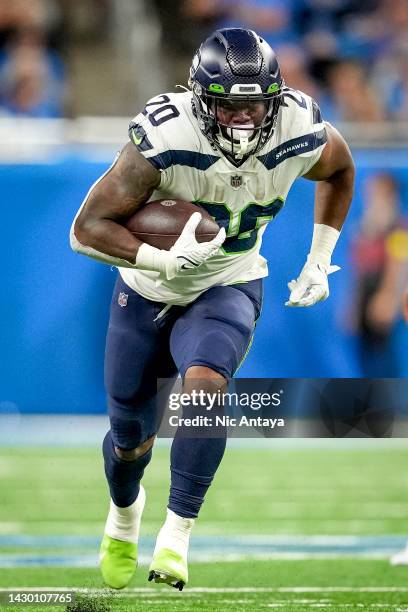 Rashaad Penny of the Seattle Seahawks runs the ball against the Detroit Lions at Ford Field on October 2, 2022 in Detroit, Michigan.