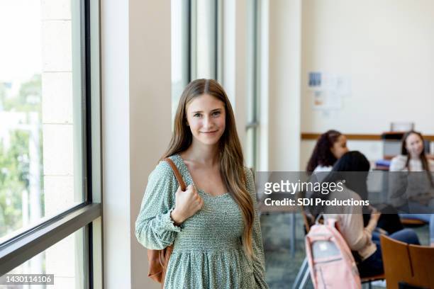 female college student smiles for the camera - meek mill supporters protest on day of status hearing stockfoto's en -beelden