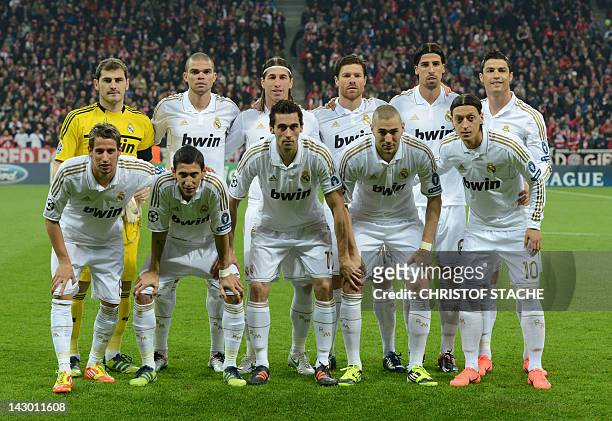 Real Madrid's Spanish goalkeeper Iker Casillas, Portuguese defender Pepe, Spanish defender Sergio Ramos, midfielder Xabi Alonso, German midfielder...