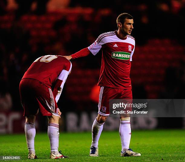 Boro player Nicky Bailey is consoled by Kevin Thompson after the npower Championship match between Middlesbrough and Doncaster Rovers at Riverside...