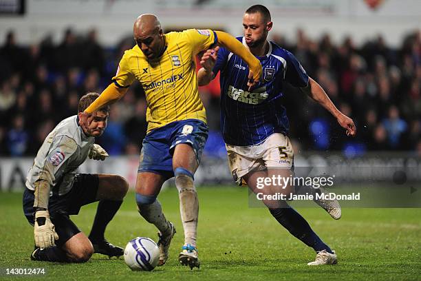 Damien Delaney of Ipswich Town battles with Marlon King of Birmingham City during the npower Championship match between Ipswich Town and Birmingham...