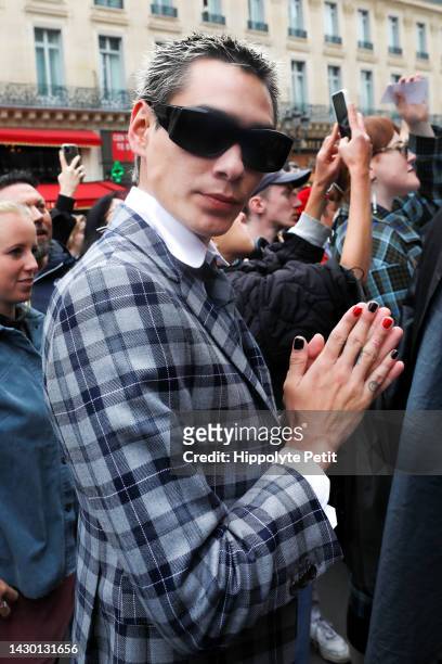 Evan Mock attends the Thom Browne Womenswear Spring/Summer 2023 show as part of Paris Fashion Week on October 03, 2022 in Paris, France.