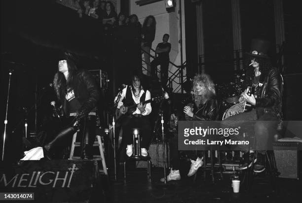Axl Rose, Izzy Stradlin, Steven Adler and Slash of Guns N' Roses perform an acoustic set at The Limelight on January 31, 1988 in New York City.