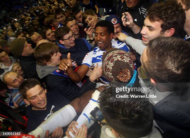 Mikele Leigertwood of Reading is congratulated by the fans after winning the npower Championship match between Reading and Nottingham Forest at...