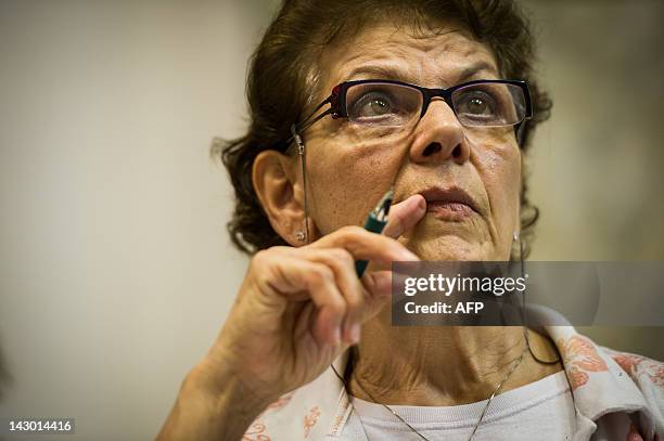 An elderly woman takes a basic English lesson at Centro de Referencia da Cidadania do Idoso in downtown Sao Paulo, Brazil on April 11, 2012. More...