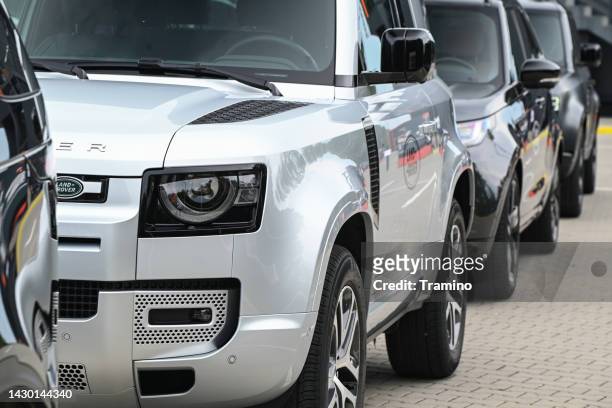 land rover vehicle on a parking - land rover stock pictures, royalty-free photos & images