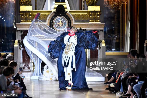 Gwendoline Christie walks the runway during the Thom Browne Ready to Wear Spring/Summer 2023 fashion show as part of the Paris Fashion Week on...