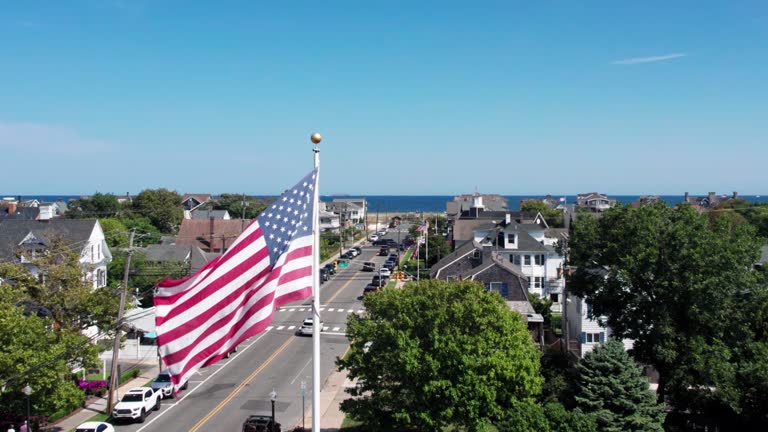 https://media.gettyimages.com/id/1430148057/video/us-flag-in-bayhead-nj.jpg?b=1&s=640x640&k=20&c=3vJw6VDWgvkGRTzwuNsWJZGhh1-2XIkXhTtdfWhyQxc=