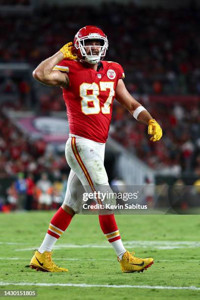 Travis Kelce of the Kansas City Chiefs smiles and celebrates after a touchdown during an NFL football game against the Tampa Bay Buccaneers at...