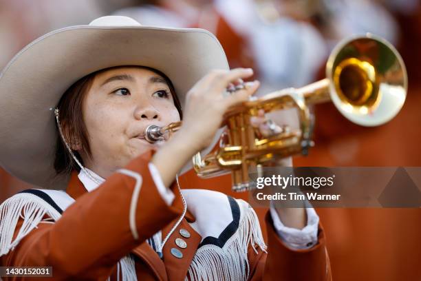 The Texas Longhorns Band performs before the game against the West Virginia Mountaineers at Darrell K Royal-Texas Memorial Stadium on October 01,...