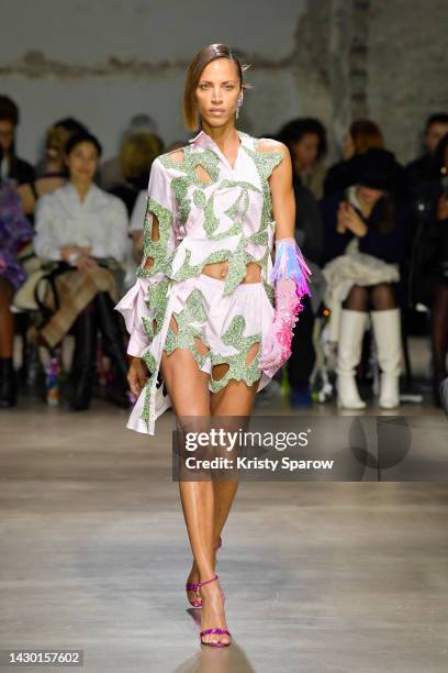 Noemie Lenoir walks the runway during the Germanier Womenswear Spring/Summer 2023 show as part of Paris Fashion Week on October 03, 2022 in Paris,...