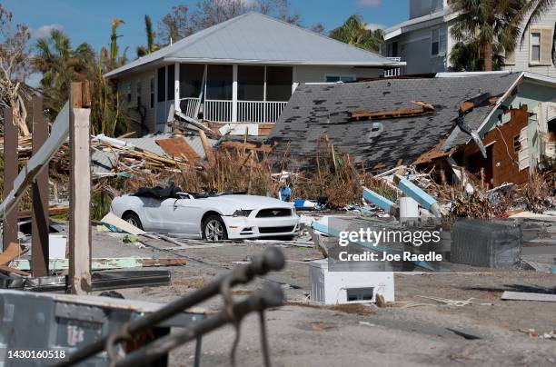 Home lies in ruins in the wake of Hurricane Ian on October 3, 2022 in Fort Myers Beach, Florida. The death toll in the state from Ian rose to at...