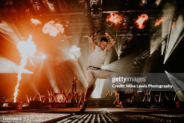 Winston McCall of Parkway Drive performs on stage at Cardiff International Arena on October 03, 2022 in Cardiff, Wales.