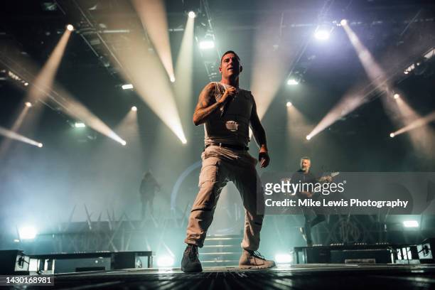 Winston McCall of Parkway Drive performs on stage at Cardiff International Arena on October 03, 2022 in Cardiff, Wales.