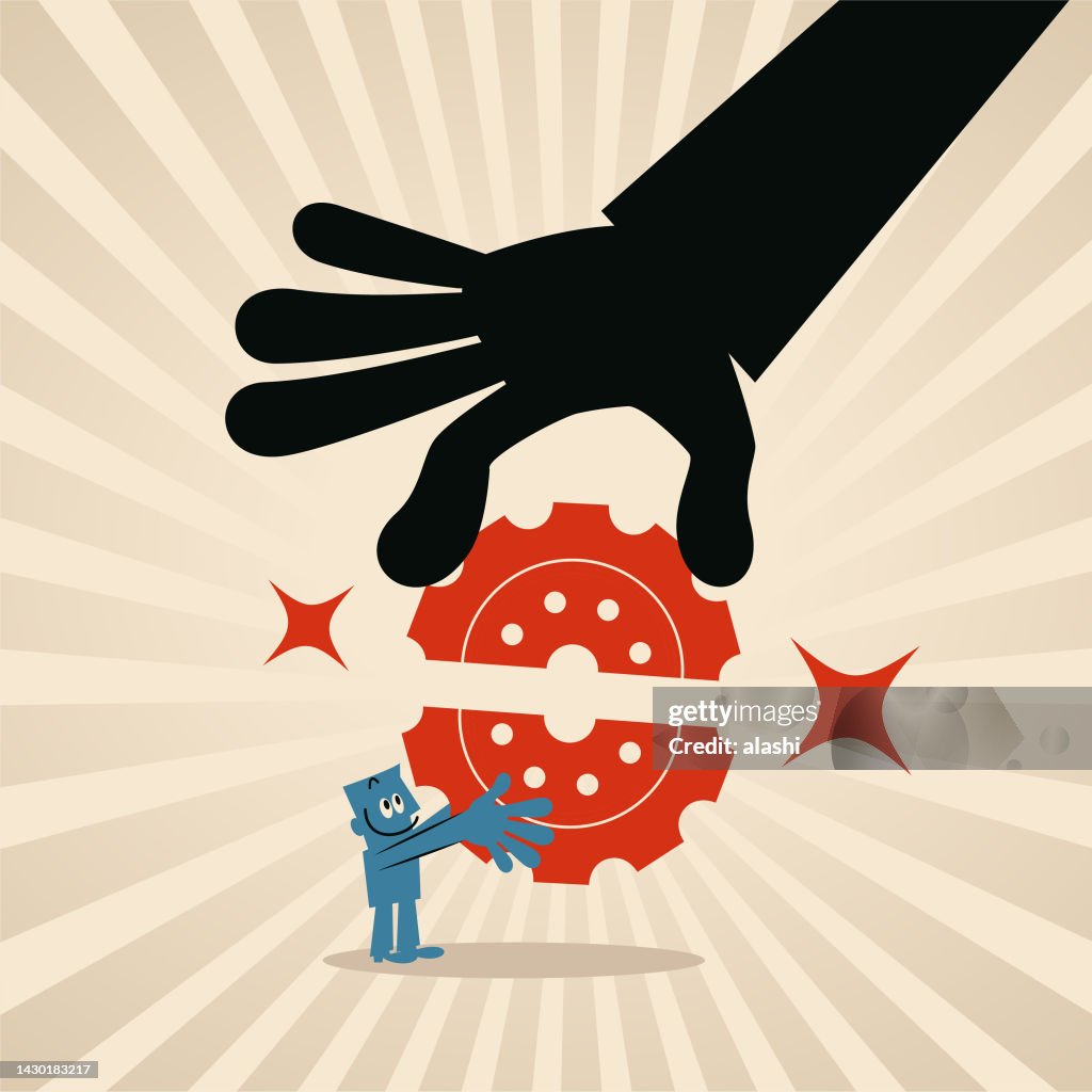 The big hand helps a man finish the cog gear jigsaw puzzle