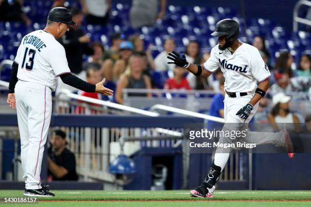 Bryan De La Cruz of the Miami Marlins rounds third base after hitting a home run during the third inning against the Atlanta Braves at loanDepot park...