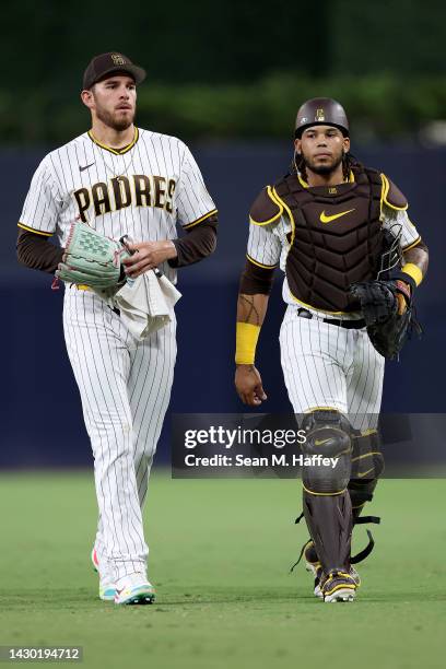 Luis Campusano and Joe Musgrove of the San Diego Padres walk to the dugout prior to a game against the San Francisco Giants at PETCO Park on October...